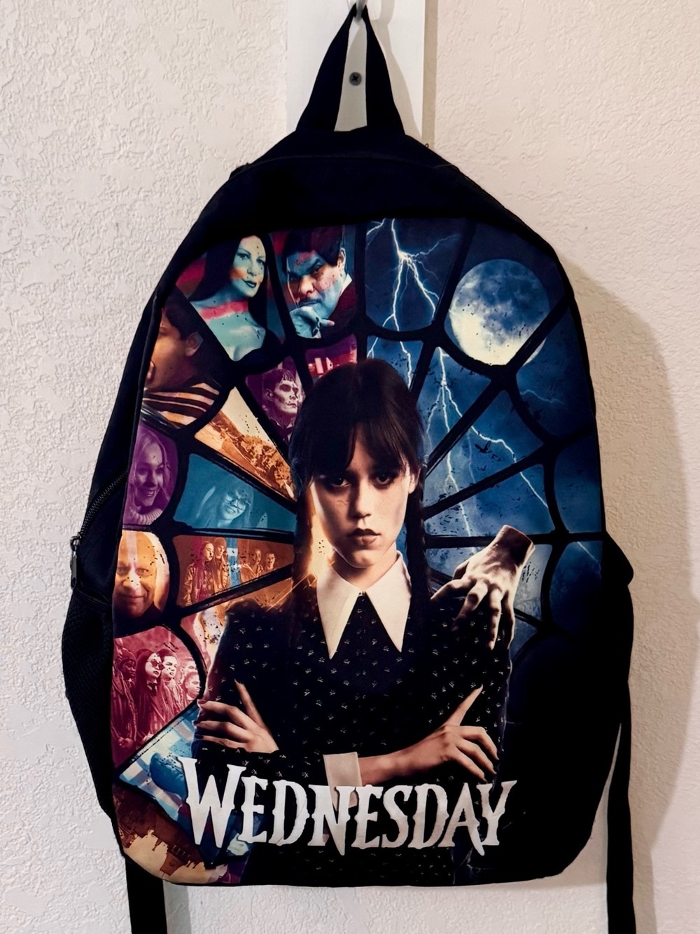Adam’s Family 
Wednesday Adam’s Black Graphic Backpack,black & vivid purple